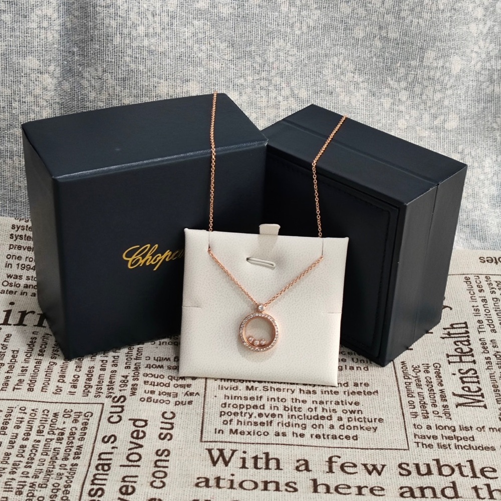 Chopard Rose Gold Open Circle Pendant Necklace with Floating Diamond Accents